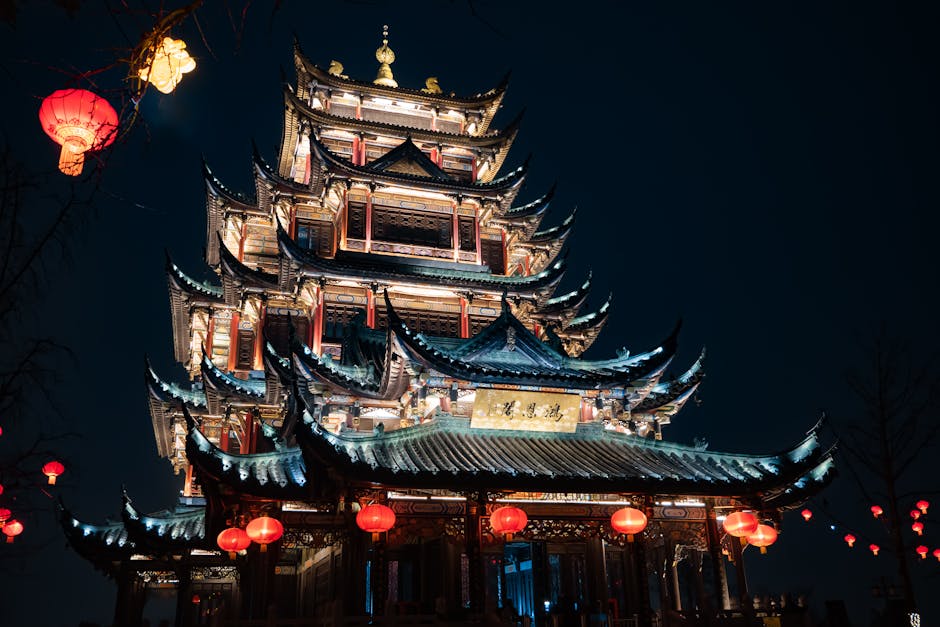 Beautiful night view of Chongqing's traditional Chinese pagoda with red lanterns